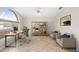 Bright home office with a large window, neutral decor, and tiled floor at 2015 Golf Manor Blvd, Valrico, FL 33596