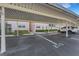 Assigned carport parking with building access at 210 Fernwood Cir # 210, Seminole, FL 33777