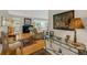 Open living room with laminate floors and neutral decor at 210 Fernwood Cir # 210, Seminole, FL 33777