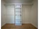 Spacious closet with custom built-in shelving and ample storage for organization and convenience at 2102 E Hamilton Ave, Tampa, FL 33610