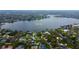 Aerial view showcasing the home's location on East Lake with pool and surrounding neighborhood at 22819 Southshore Dr, Land O Lakes, FL 34639