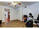 Bedroom with wood laminate floors and a ceiling fan at 22819 Southshore Dr, Land O Lakes, FL 34639