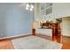 Spacious living room with hardwood floors and view of kitchen at 22819 Southshore Dr, Land O Lakes, FL 34639