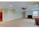 Spacious living room with fireplace and neutral tones, ready for personalization at 22819 Southshore Dr, Land O Lakes, FL 34639