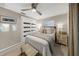 Serene bedroom featuring neutral tones, plush bedding, and soft lighting, enhancing the calming atmosphere at 2370 Jones Dr, Dunedin, FL 34698