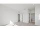 Bright, white bedroom with modern doors leading to closet and bathroom at 307 15Th N St, St Petersburg, FL 33705