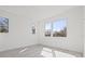 Bright bedroom with lots of natural light and windows overlooking lush trees at 307 15Th N St, St Petersburg, FL 33705