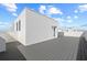 Wide roof deck with gray planks, white walls, and black railings, offering an open-air space at 307 15Th N St, St Petersburg, FL 33705