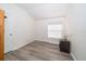 Cozy bedroom with natural light and modern flooring, inviting and comfortable at 31826 Larkenheath Dr, Wesley Chapel, FL 33543
