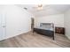 Inviting bedroom with bright window, ceiling fan, and modern flooring at 31826 Larkenheath Dr, Wesley Chapel, FL 33543