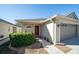 Beautiful single-story home with a well-kept lawn and inviting entryway at 31826 Larkenheath Dr, Wesley Chapel, FL 33543