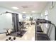 Bright gym features exercise equipment, weight training, and cardio machines at 31826 Larkenheath Dr, Wesley Chapel, FL 33543