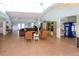 A spacious lounge area with seating for residents and guests at 31826 Larkenheath Dr, Wesley Chapel, FL 33543