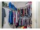 Spacious walk-in closet with ample shelving and organized storage solutions at 31826 Larkenheath Dr, Wesley Chapel, FL 33543