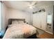 Cozy bedroom with a comfortable bed, soft lighting, and built in storage, creating a relaxing atmosphere at 3367 Crystal E Ct # F, Palm Harbor, FL 34685