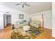 Cozy living room featuring neutral color palette, comfortable furniture, and natural light at 3367 Crystal E Ct # F, Palm Harbor, FL 34685