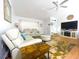 Comfortable living room featuring a neutral color palette, modern furniture, and natural light at 3367 Crystal E Ct # F, Palm Harbor, FL 34685
