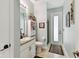 Bathroom with light vanity and granite counter top, accompanied by an outdoor access at 3900 W Platt St, Tampa, FL 33609