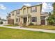 Charming two-story home with a well-manicured lawn and an inviting front porch at 3900 W Platt St, Tampa, FL 33609