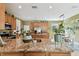 Beautiful kitchen island featuring granite countertops and stainless steel appliances at 3900 W Platt St, Tampa, FL 33609