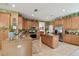 Spacious kitchen featuring granite countertops, stainless appliances, and an island at 3900 W Platt St, Tampa, FL 33609
