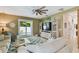 Spacious living room with access to the pool area and a decorative entertainment center at 3900 W Platt St, Tampa, FL 33609