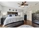 Large main bedroom suite with hardwood floors, fan and plenty of closet space at 3900 W Platt St, Tampa, FL 33609