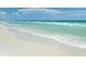 Beautiful beach front showcasing white sand and ocean with crystal clear water at 417 Tennessee Ave, Crystal Beach, FL 34681