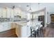 Modern kitchen with stainless steel appliances, granite counters and center island with seating at 417 Tennessee Ave, Crystal Beach, FL 34681