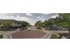Street view of a charming neighborhood with tree-lined streets and well-maintained sidewalks at 417 Tennessee Ave, Crystal Beach, FL 34681