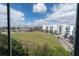 A beautiful green space with a view of the community and bright blue skies at 4221 W Spruce St # 1407, Tampa, FL 33607