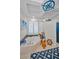 Bathroom boasting a corner tub, nautical decor, and a charming stool at 4677 Aylesford Dr, Palm Harbor, FL 34685