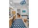 Bathroom boasting dual sinks, an adjacent tub, and nautical themed decor at 4677 Aylesford Dr, Palm Harbor, FL 34685