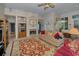 Inviting living room boasts a fireplace, comfortable seating, and plenty of natural light at 4677 Aylesford Dr, Palm Harbor, FL 34685