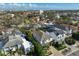 Aerial view of the home and neighborhood including mature trees and green landscaping at 47 Adalia Ave, Tampa, FL 33606