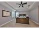 Main bedroom featuring plush carpet, large windows, and neutral paint at 47 Adalia Ave, Tampa, FL 33606