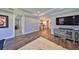 Bright living room with wood floors, a blue console and an inviting rug at 47 Adalia Ave, Tampa, FL 33606