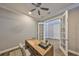 Bright office with French doors, wood-look floors, and ample light fixtures at 47 Adalia Ave, Tampa, FL 33606