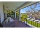 Inviting porch offering comfortable seating and scenic backyard views at 47 Adalia Ave, Tampa, FL 33606