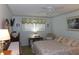 Comfortable bedroom with natural light at 5660 80Th N St # A205, St Petersburg, FL 33709