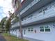 Multi-story condominium building with multiple balconies at 5660 80Th N St # A205, St Petersburg, FL 33709