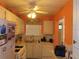 Bright kitchen with white cabinets and ample counter space at 5660 80Th N St # A205, St Petersburg, FL 33709