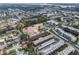 An aerial view of a multi-Gathering residential community, showcasing lush landscaping and convenient parking and amenities at 5967 Terrace Park N Dr # 202, St Petersburg, FL 33709