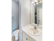 Bathroom featuring a toilet, sink and mirror at 5967 Terrace Park N Dr # 202, St Petersburg, FL 33709