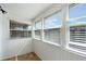Bright sunroom featuring a fan and plenty of natural light at 5967 Terrace Park N Dr # 202, St Petersburg, FL 33709