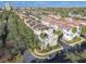 Aerial view showcasing the community, featuring manicured landscaping and streetscapes at 6030 Printery St # 108, Tampa, FL 33616