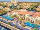 Breathtaking aerial view of a resort-style community with multiple pools and beautifully landscaped grounds at 6030 Printery St # 108, Tampa, FL 33616
