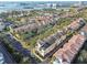 Community aerial view featuring lush tree coverage, surrounding bodies of water, and well maintained streets at 6030 Printery St # 108, Tampa, FL 33616