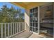 Balcony leading to a bedroom with a chandelier at 6030 Printery St # 108, Tampa, FL 33616