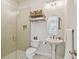 Bright bathroom featuring modern vanity, glass shower and neutral tones at 6030 Printery St # 108, Tampa, FL 33616